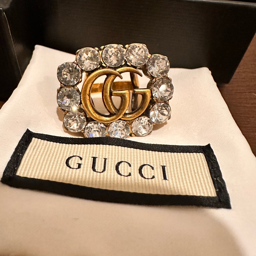 Gucci ring size 6.5. Used about three times. Comes with box and bag.